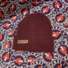 Burgundy beanie with ROCKET Logo on the cuff