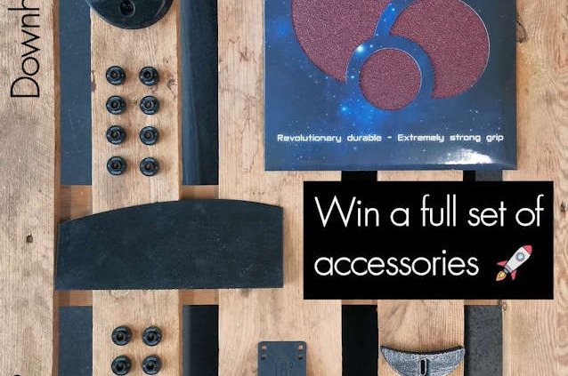 Accessories contest to celebrate our updated footstops. All accessories laid flat across a wooden pallet table